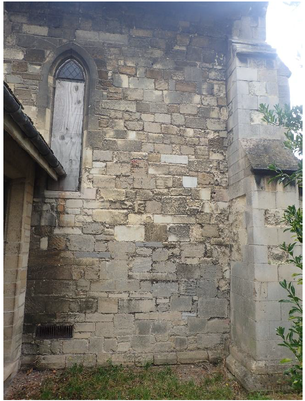 Fig. 10. Nave north, west end. Wall of reused coarse grey Barnack, medium-grained yellow Ketton and fine-grained white Clunch.