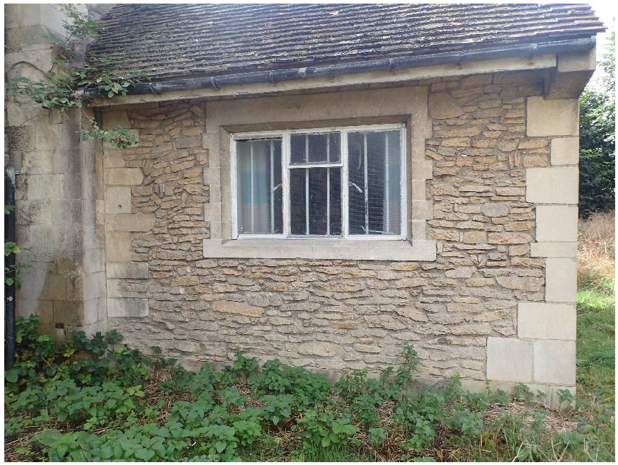 Fig. 13. Choir vestry east. Walling of shelly ragstone laid in undulating and, in places, chaotic courses. The window is Weldon, the quoins are Ketton.